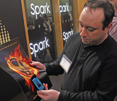 Greg Carron of BNotions, which develops mobile apps, demonstrates an NFC tag embedded movie poster